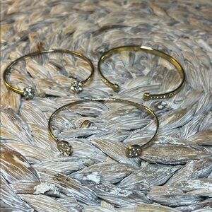 Trio of Gold Tone and Rhinestone Open Cuff Adjustable Bracelet Set